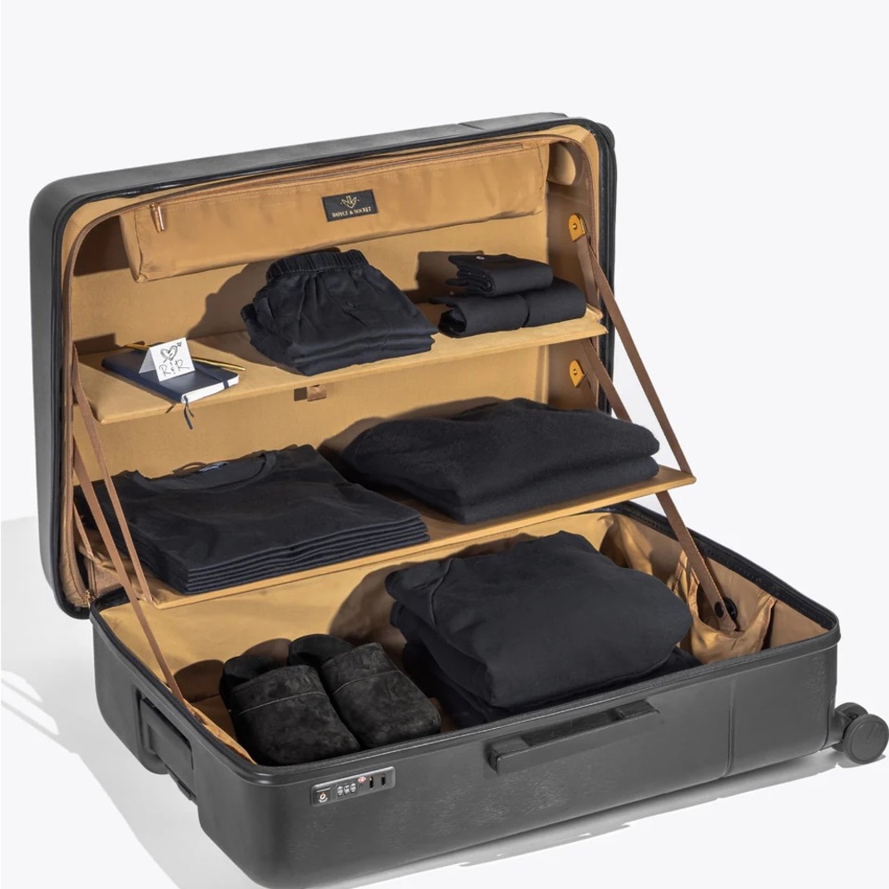 Royce & Rocket luxury black suitcase.